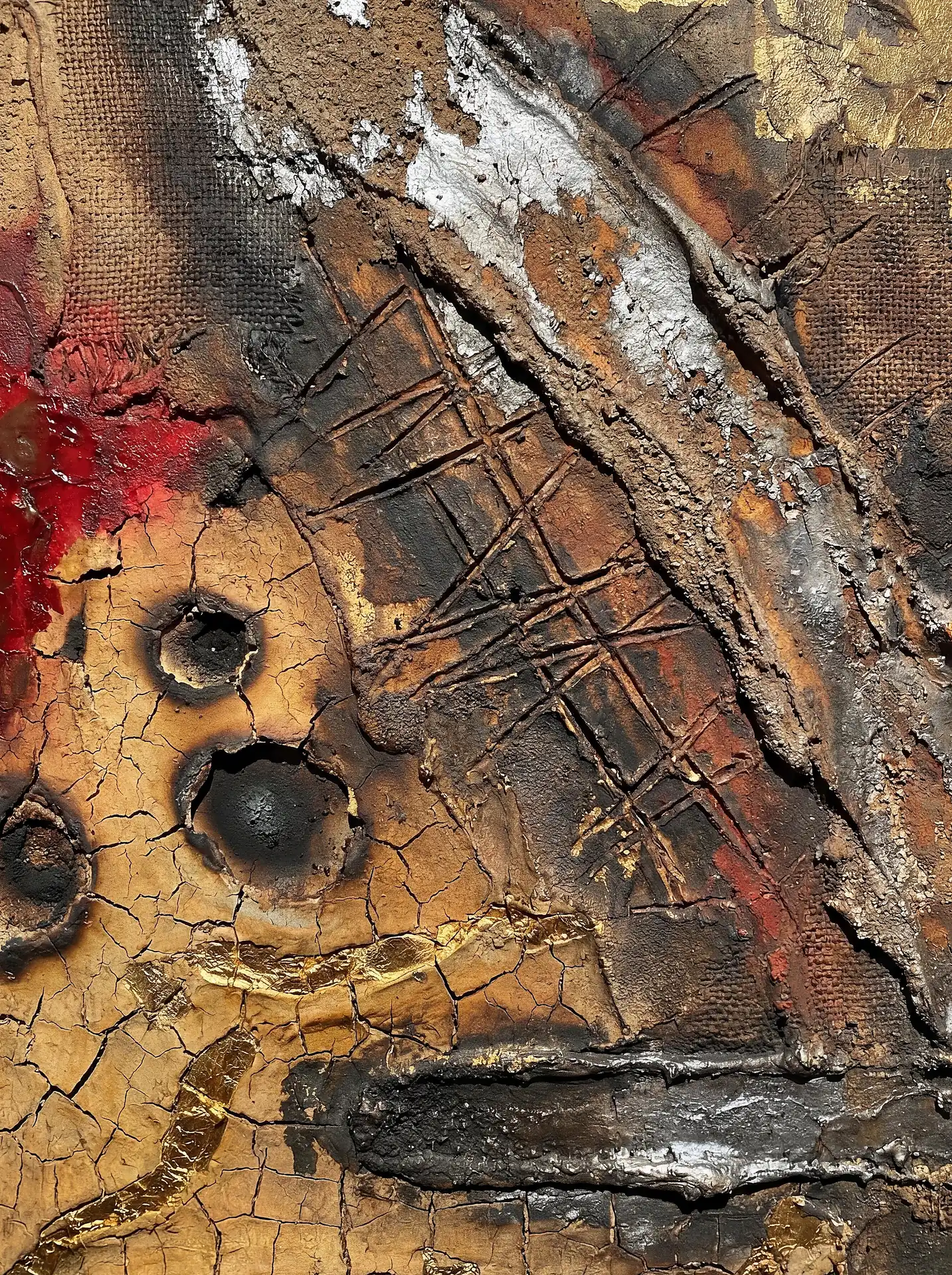 Textured abstract composition mixed media painting featuring heavy impasto, metallic leaf, and cracked earth effects. Warm ochre tones and deep reds provide a backdrop for the dramatic silver and gold highlights in this contemporary expressive artwork. Artwork by Constantine Cheshire