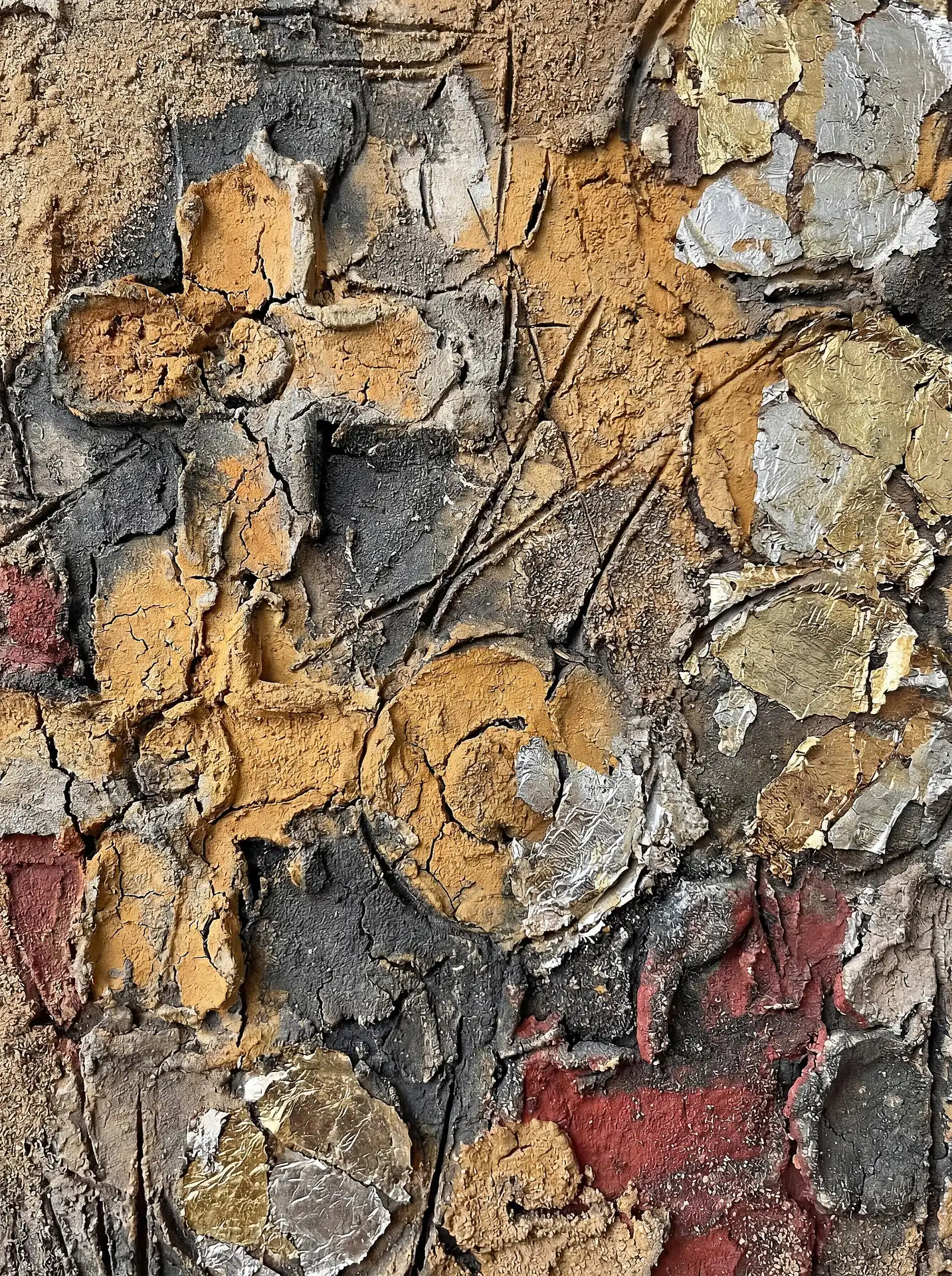 Coarse cracked plaster and metallic gold foil create a deeply tactile surface in this abstract mixed media work. Earthy ochre, deep red, and slate grey tones merge with shimmering silver fragments to evoke a sense of ancient weathered walls or geological erosion. Artwork by Constantine Cheshire