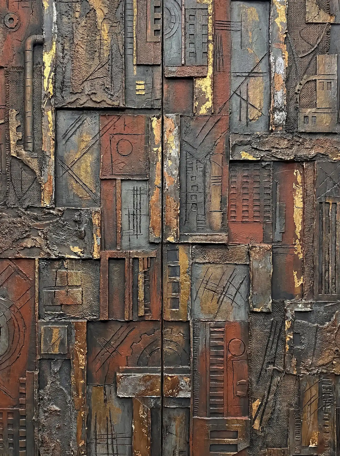 Muted earthy tones and metallic gold accents highlight this complex industrial relief sculpture featuring various geometric shapes and mechanical textures. This abstract piece combines a weathered, architectural aesthetic with a steampunk-inspired mood through its layers of bronze and iron hues. Artwork by Constantine Cheshire