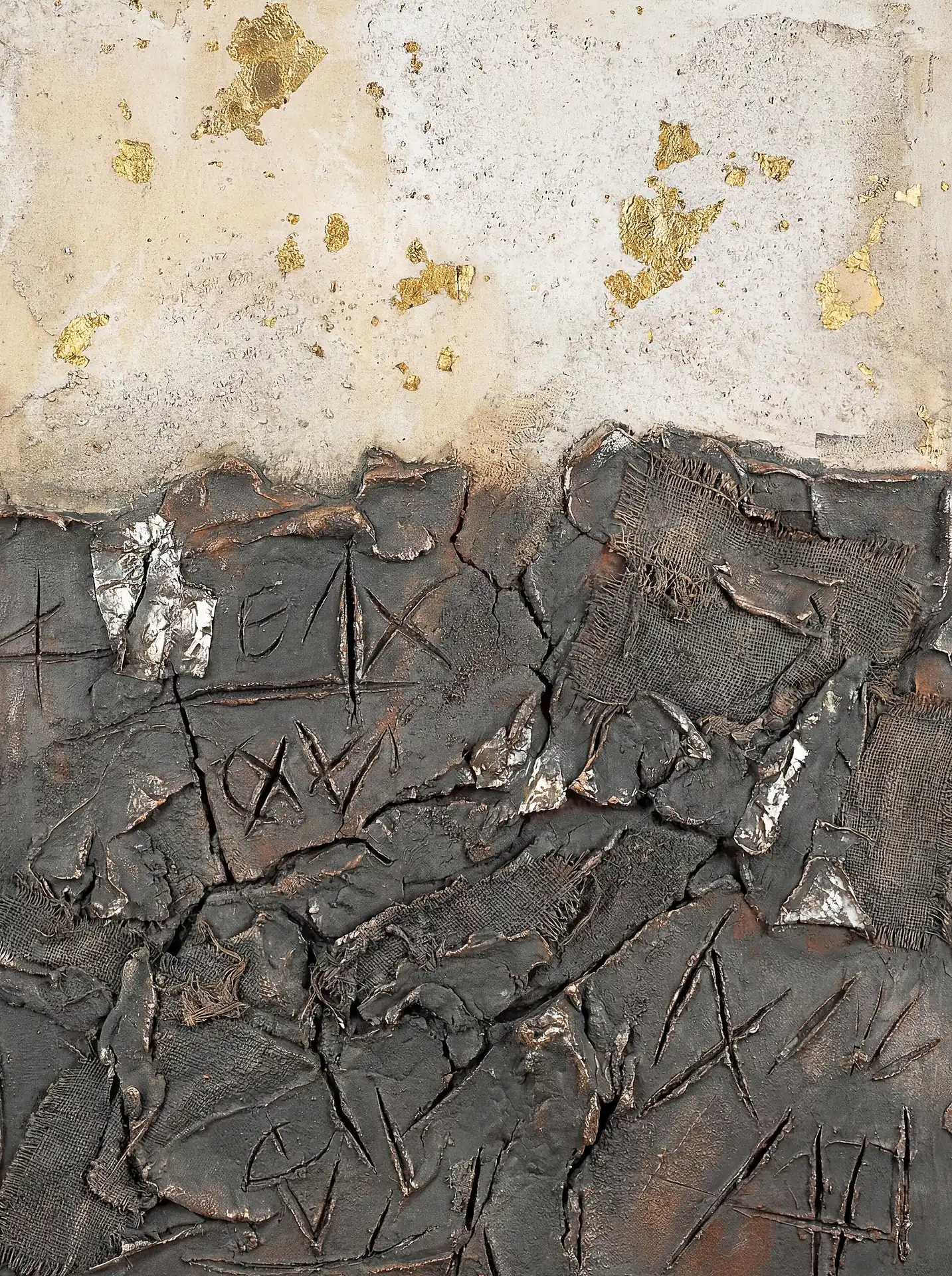 Mysterious and age-worn, this mixed-media artwork features deep charcoal cracked textures embedded with burlap and marked by cryptic carvings. Above the dark terrain, a creamy plaster surface is punctuated by luminous gold leaf flakes, creating a striking contrast between raw industrial decay and refined elegance. Artwork by Constantine Cheshire
