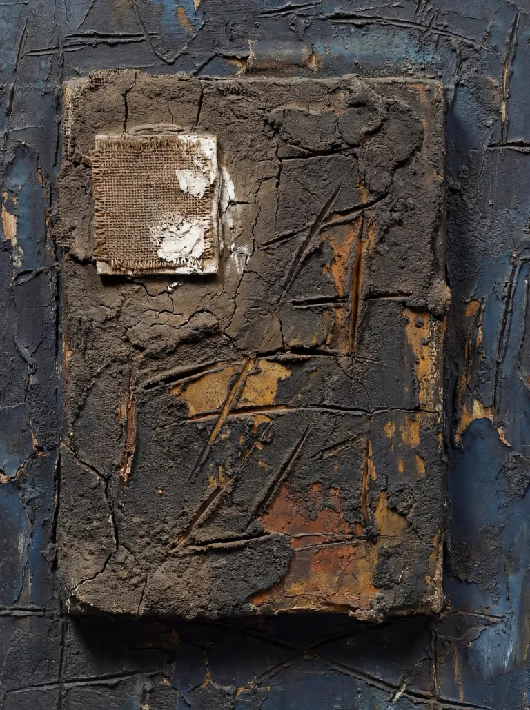 Cracked earth and burlap mixed media painting featuring a heavy impasto technique and deep blue tones. This sculptural relief artwork uses raw materials to create a gritty, industrial atmosphere with layers of mud-like texture and distressed surfaces. Artwork by Constantine Cheshire