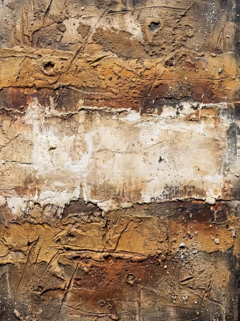 Warm ochre and cool white tones dominate this heavily textured abstract painting reminiscent of a weathered stone facade. The thick impasto application creates deep shadows and physical depth, suggesting an aged urban wall or geological strata. Artwork by Constantine Cheshire