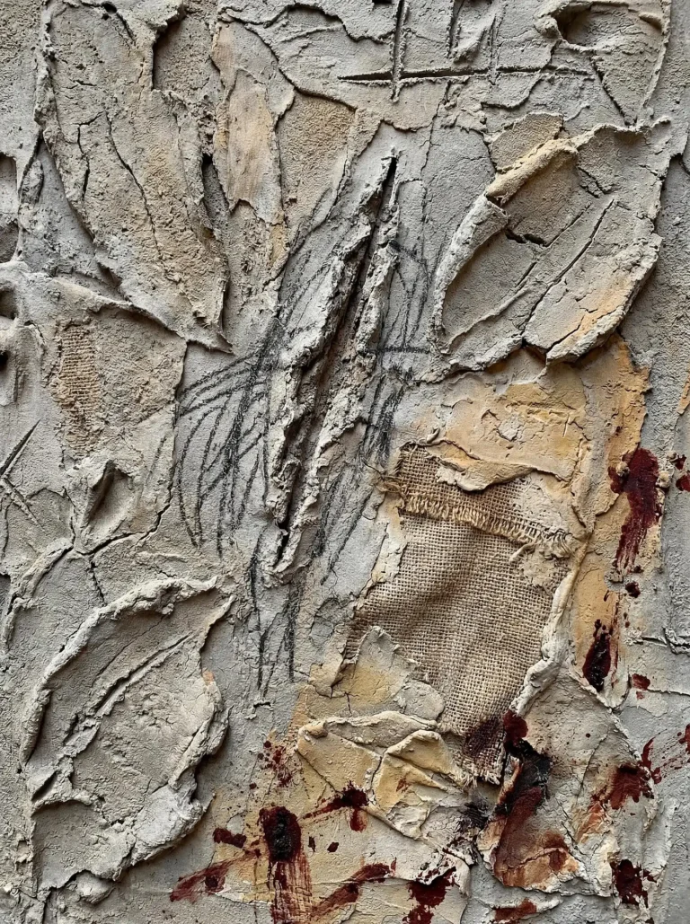 Textured plaster and burlap mixed media abstract artwork. Heavy relief layers in neutral beige and grey are accented by expressive charcoal scribbles and dark red stains, creating a weathered and gritty industrial mood. Artwork by Constantine Cheshire
