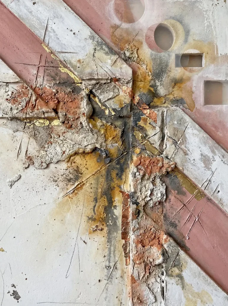 Soft dusty pink and white tones define this heavily textured mixed media piece featuring geometric cutouts and metallic leaf. The artwork combines architectural lines with raw, erupting plaster to create a complex industrial and archaeological aesthetic. Artwork by Constantine Cheshire