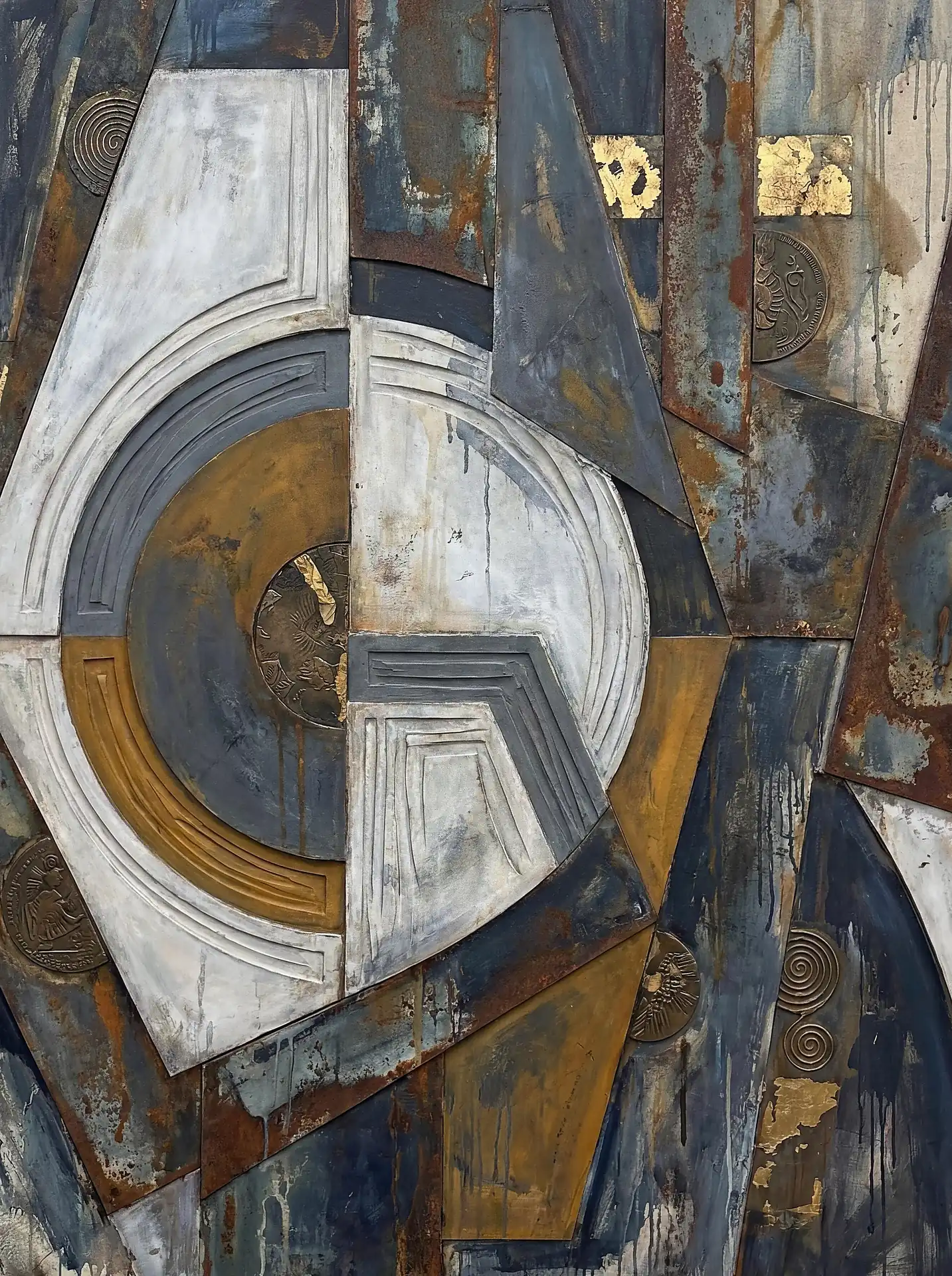Layering geometric panels and circular motifs, this industrial mixed media piece features a rich interplay of rusted iron textures and shimmering gold leaf. The composition balances heavy metallic grays and deep blues with weathered ochre tones and embossed relief medallions for a sophisticated, weathered aesthetic. Artwork by Constantine Cheshire