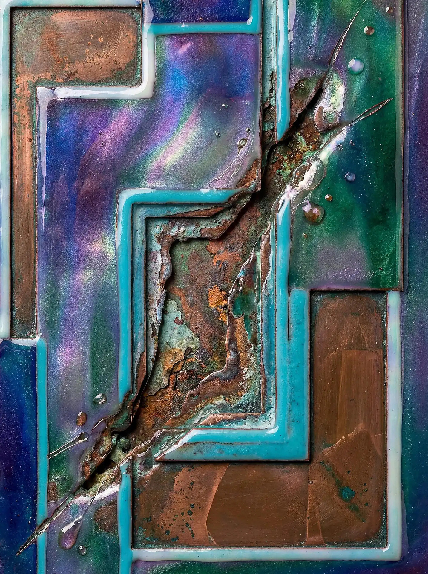 Layering of geometric shapes and iridescent teal enamel creates a complex relief surface defined by a jagged diagonal fissure and deep metallic corrosion. This mixed media artwork blends the industrial grit of weathered copper with a shimmering modern patina to evoke a sense of futuristic decay. Artwork by Constantine Cheshire