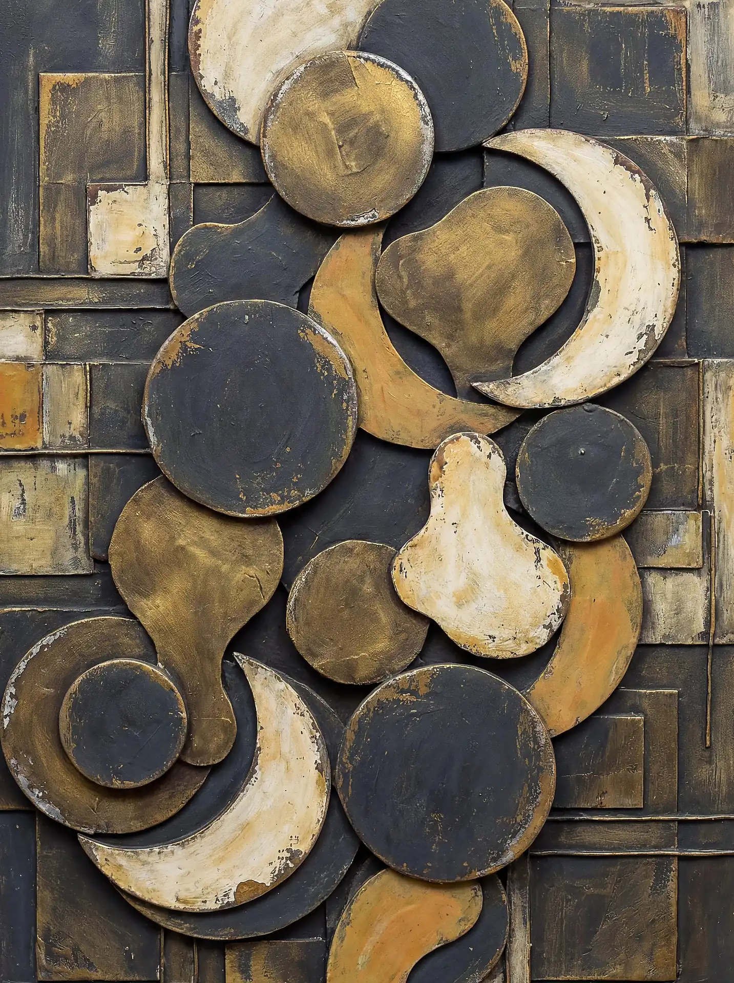 Rising from the textured panel, these golden lunar crescents and circular forms create a striking industrial relief. This contemporary mixed media artwork blends weathered metallic tones of gold, black, and bronze into a sophisticated celestial composition. Artwork by Constantine Cheshire