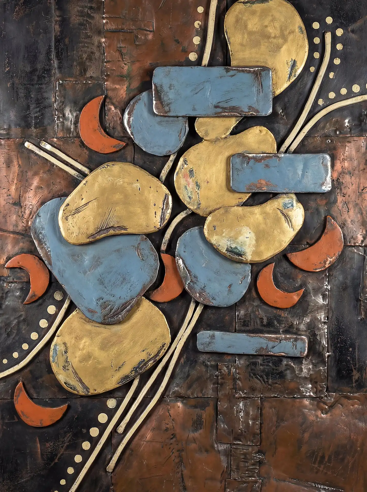Flowing across a dark patinated copper surface, this abstract relief sculpture features a rhythmic arrangement of gold and blue organic shapes. The industrial composition combines metallic textures with vibrant orange crescents and geometric lines to create a sophisticated mid-century modern aesthetic. Artwork by Constantine Cheshire