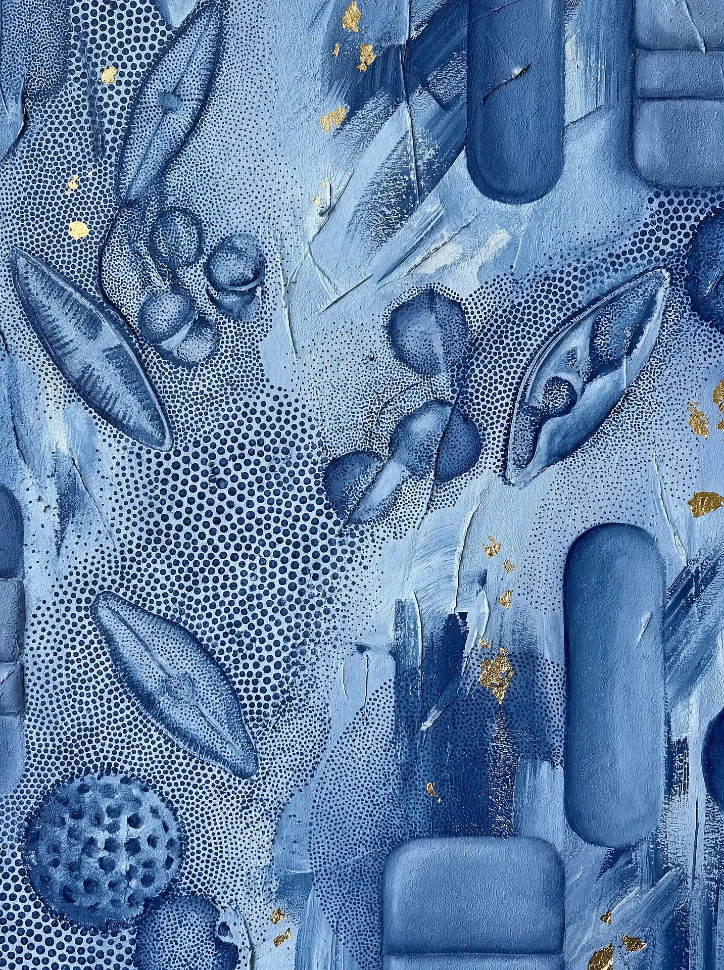 Thick impasto textures and delicate gold leaf flecks create a layered composition of organic blue shapes and stippled patterns. This contemporary abstract piece uses varied shades of indigo and azure to evoke a sense of calm depth and tactile intrigue. Artwork by Constantine Cheshire