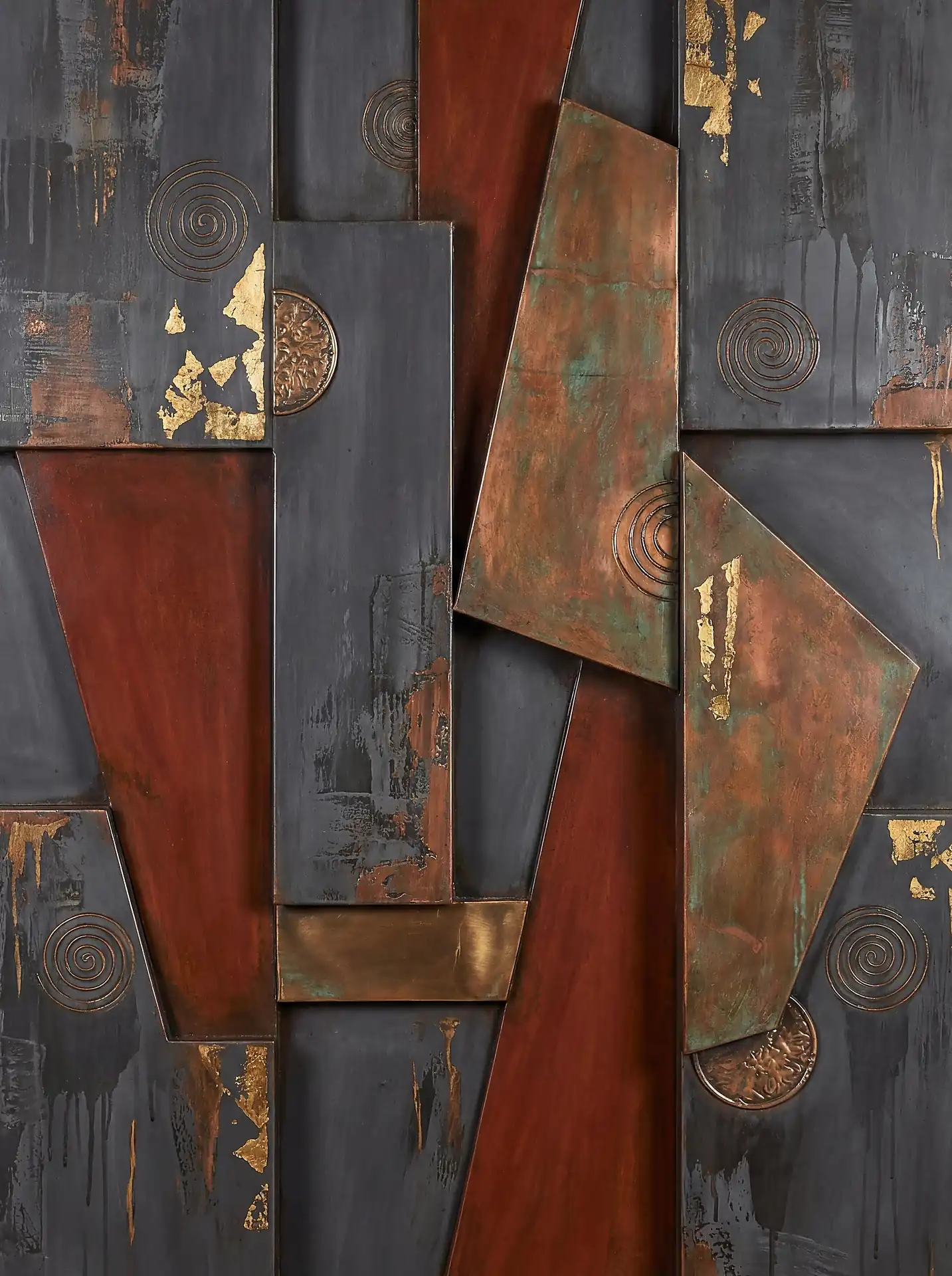 Sophisticated and industrial, these overlapping copper and iron plates feature hand-engraved spirals and shimmering gold leaf accents. This textured abstract composition blends warm rust tones with cool charcoal grays to create a striking focal point for modern interior design. Artwork by Constantine Cheshire