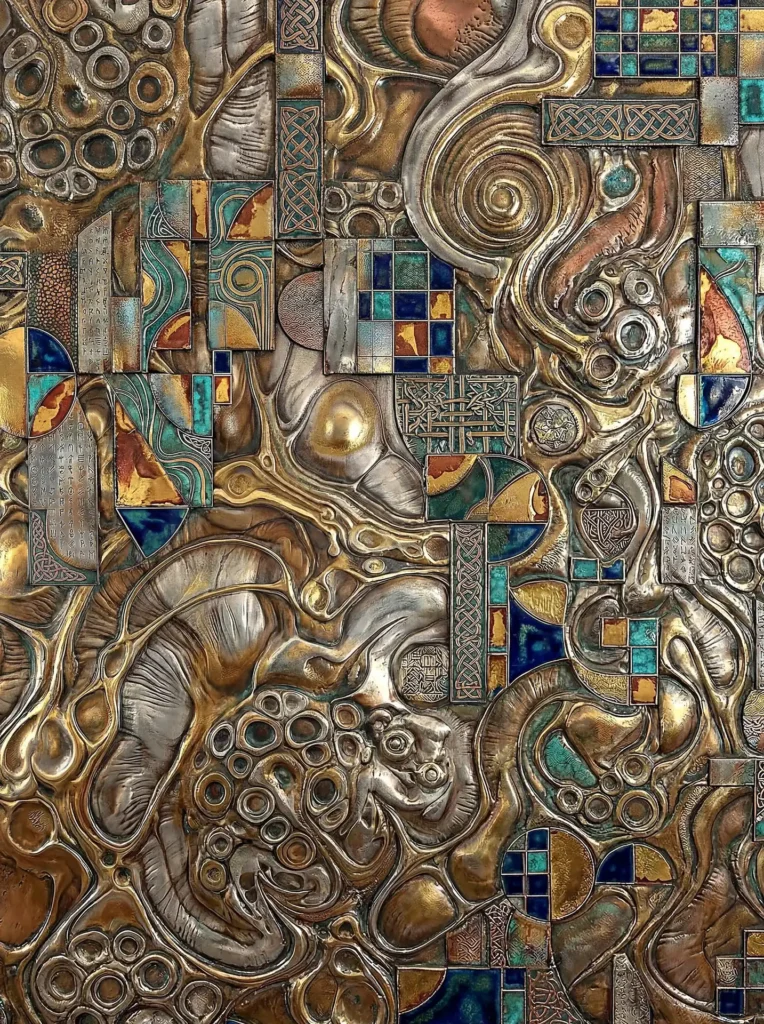 Abstract metallic relief sculpture featuring a complex blend of organic swirling forms, structured Celtic knotwork, and vibrant blue mosaic accents. This industrial-style artwork utilizes a rich palette of gold, silver, and copper to create a textured, multi-layered aesthetic reminiscent of ancient alchemy. Artwork by Constantine Cheshire